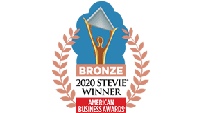 Bronze award badge from the american business awards featuring an abstract figure holding a star.
