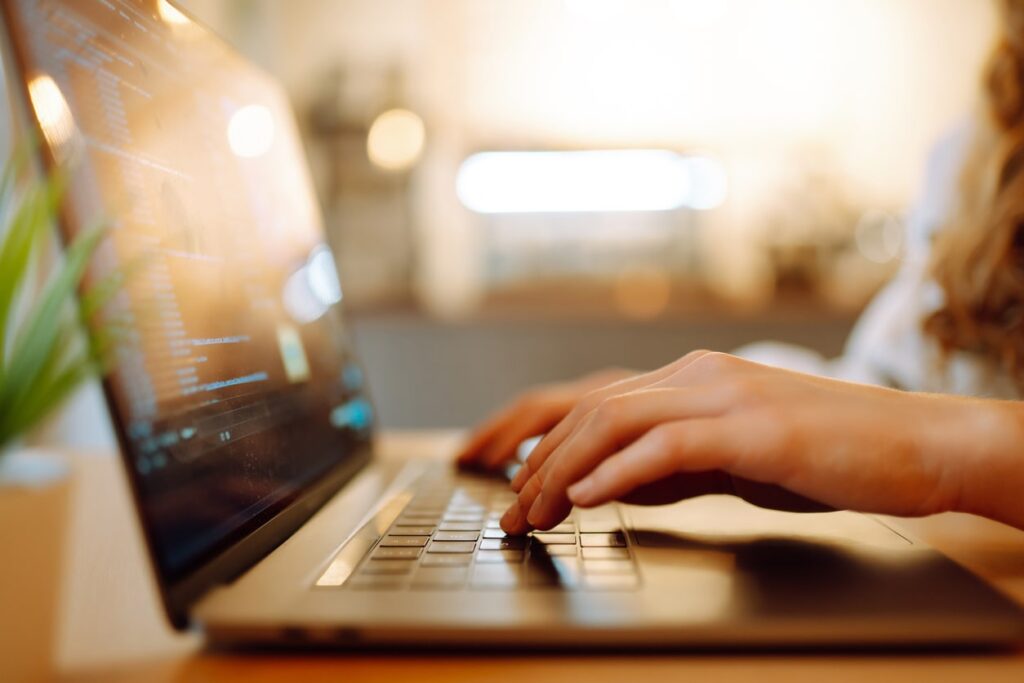 woman in public sector working at desk using the Euna Payments template for building a winning RFP for payment kiosk solutions